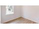 Cozy bedroom with natural light and wood flooring, perfect for relaxation and rest at 15215 Sw 43Rd Ct, Ocala, FL 34473