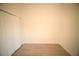 Cozy bedroom featuring light wood floors and a double door closet at 15215 Sw 43Rd Ct, Ocala, FL 34473