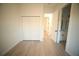 Bedroom featuring a double door closet and access to an ensuite bathroom at 15215 Sw 43Rd Ct, Ocala, FL 34473