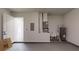 Attached garage featuring utility sink and water heater, providing convenience at 15215 Sw 43Rd Ct, Ocala, FL 34473
