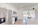 Modern kitchen features stainless steel appliances and sleek white cabinetry at 15215 Sw 43Rd Ct, Ocala, FL 34473
