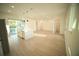 Bright kitchen with a center island, stainless steel appliances, and access to backyard at 15215 Sw 43Rd Ct, Ocala, FL 34473
