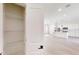 A full view of the living area and kitchen from the pantry with wire shelving at 15215 Sw 43Rd Ct, Ocala, FL 34473