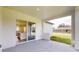 Covered patio with view of kitchen and backyard at 15215 Sw 43Rd Ct, Ocala, FL 34473