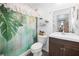 Charming bathroom with a shower featuring a decorative curtain, and a wood-finished vanity at 15324 Sw 40Th Place Rd, Ocala, FL 34481