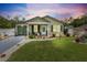 Charming single story home featuring a manicured lawn and attractive landscaping at 15324 Sw 40Th Place Rd, Ocala, FL 34481
