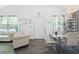 Bright living room featuring stylish furniture, wood floors and lots of natural light at 15324 Sw 40Th Place Rd, Ocala, FL 34481