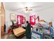 Cluttered bedroom with a ceiling fan at 17128 Se 140Th Ave, Weirsdale, FL 32195