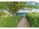 Inviting home with a well-maintained lawn and mature trees adding natural beauty at 17128 Se 140Th Ave, Weirsdale, FL 32195