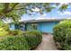 Welcoming home featuring a garage and a neatly landscaped front yard at 17128 Se 140Th Ave, Weirsdale, FL 32195