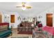A living room that features neutral colors and a comfortable sofa at 17128 Se 140Th Ave, Weirsdale, FL 32195