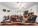 Bright living room offering comfortable furniture, a ceiling fan and nice decor at 17128 Se 140Th Ave, Weirsdale, FL 32195