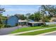 Charming single-Gathering home with manicured front yard and mature trees at 2922 Cocovia Way, Leesburg, FL 34748