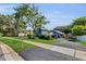 Charming single-Gathering home with manicured front yard and mature trees at 2922 Cocovia Way, Leesburg, FL 34748