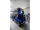Garage with a blue golf cart and golf clubs at 3024 Burbank Ln, The Villages, FL 32162