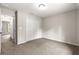 Bedroom featuring carpet flooring, a double-door closet, and natural light at 3445 Se 139Th Ln, Summerfield, FL 34491