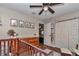 Bedroom features wood-look tile flooring, closet, and an open doorway to the hall at 4085 Ne 17Th Ave, Ocala, FL 34479