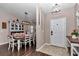 Inviting dining area with dark wood floors and an open floor plan at 4085 Ne 17Th Ave, Ocala, FL 34479