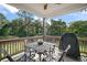 Outdoor patio area perfect for entertaining with comfortable seating and views of mature trees at 4673 Se 115Th St, Belleview, FL 34420