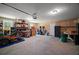 Spacious garage with ample storage space and work area, perfect for hobbies and projects at 4673 Se 115Th St, Belleview, FL 34420