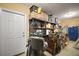 Garage featuring a storage area, shelving, and well-organized space at 4673 Se 115Th St, Belleview, FL 34420