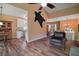 Comfortable living room that provides easy access to the kitchen and dining areas at 4673 Se 115Th St, Belleview, FL 34420