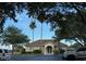 Community clubhouse featuring lush landscaping and ample parking at 4940 Sw 63Rd Loop, Ocala, FL 34474