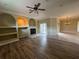 Cozy living room with hardwood floors and a fireplace at 4940 Sw 63Rd Loop, Ocala, FL 34474