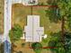 Aerial view showcasing a large property with mature trees and well-defined property lines at 5005 Ne 22Nd Ave, Ocala, FL 34479