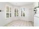 Cozy breakfast nook with tile floors, plantation shutters and natural light at 5007 Kelso St, Leesburg, FL 34748
