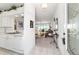 Open concept entryway leading to the living room and kitchen area at 5007 Kelso St, Leesburg, FL 34748