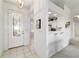 Open concept entryway leading to the living room and kitchen area at 5007 Kelso St, Leesburg, FL 34748