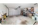Spacious garage with an automatic door and ample storage, ready for your vehicles and hobbies at 5007 Kelso St, Leesburg, FL 34748