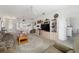 Open-concept living room and dining area providing ample seating and natural light at 5007 Kelso St, Leesburg, FL 34748