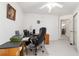 Bright office featuring a ceiling fan, and a desk at 5007 Kelso St, Leesburg, FL 34748
