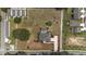 Aerial view of home with pool and expansive lot showcasing the property's layout and surroundings at 5092 Ne 81St Blvd, Wildwood, FL 34785