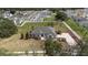 Aerial view showing the home's placement within the community, with landscaping and spacious yard at 5092 Ne 81St Blvd, Wildwood, FL 34785