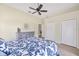 Calming bedroom with large windows and stylish furniture, perfect for relaxation and rest at 5092 Ne 81St Blvd, Wildwood, FL 34785