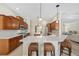 Modern kitchen features quartz countertops, shaker cabinets, and stainless appliances at 5092 Ne 81St Blvd, Wildwood, FL 34785