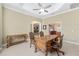 The office is open to the kitchen and the living room and features a wood desk at 5092 Ne 81St Blvd, Wildwood, FL 34785