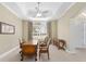 Home office showcases a decorative wood desk and an abundance of natural light at 5092 Ne 81St Blvd, Wildwood, FL 34785