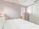 Bedroom with shutters, carpet, and a closet with sliding doors at 5651 Nw 40Th Pl, Ocala, FL 34482