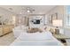 Charming living room with built-ins, neutral tones, and comfortable seating arrangements at 5651 Nw 40Th Pl, Ocala, FL 34482