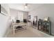 Office with desk, shutters, and display case with memorabilia at 5651 Nw 40Th Pl, Ocala, FL 34482