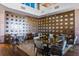 Interior of the clubhouse restaurant with modern decor, accent wall, and wooden tables at 5651 Nw 40Th Pl, Ocala, FL 34482