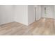 Minimalist space with bright white walls leading to front door and hallways at 7203 Sw 86Th Ave, Ocala, FL 34481