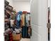Walk-in closet with clothes and luggage, providing ample storage at 8142 Sw 59Th Ave, Ocala, FL 34476