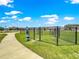 Community dog park with separate enclosures, providing a safe and fun space for pets at 8142 Sw 59Th Ave, Ocala, FL 34476
