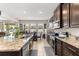 Kitchen featuring dark cabinets, granite countertops and stainless steel appliances at 8142 Sw 59Th Ave, Ocala, FL 34476
