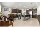 Open-concept kitchen with island seating, stainless steel appliances, and lots of cabinet space at 8142 Sw 59Th Ave, Ocala, FL 34476
